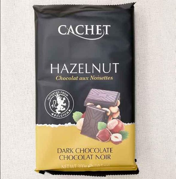 Шоколад кашет з цілим фундуком Cachet Dark chocolate Hazelnut 300 г Бельгія 20220105015 фото